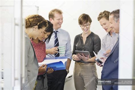 Business people talking at modern office — mobility, Digital Tablet - Stock Photo | #199750028