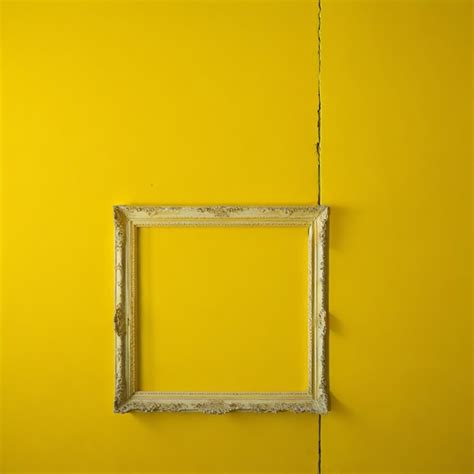 Premium AI Image | frame by a yellow wall