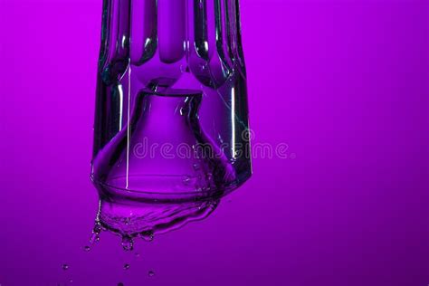 The Water Splashing in Glass on Lilac Background Stock Photo - Image of fresh, freshness: 112276458