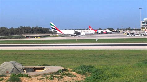 Emirates landing at Malta International Airport on 02.12.2014 - YouTube