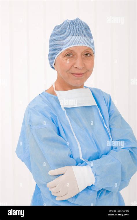 Senior surgeon female with operation clothes mask Stock Photo - Alamy