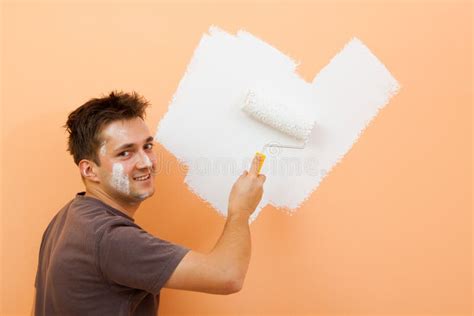 Man painting a wall stock image. Image of brown, copy - 12526405