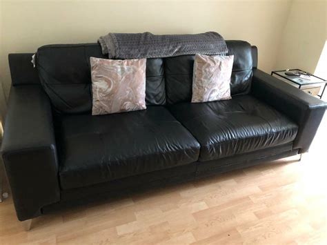 Black leather DFS sofa | in Edenthorpe, South Yorkshire | Gumtree