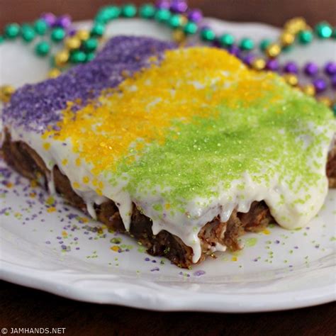 King Cake Bread Pudding with Bourbon Cream Cheese Frosting