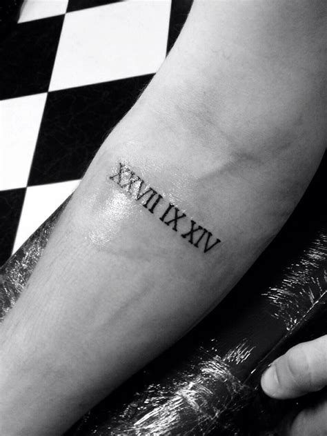 14 Roman Numeral Tattoo