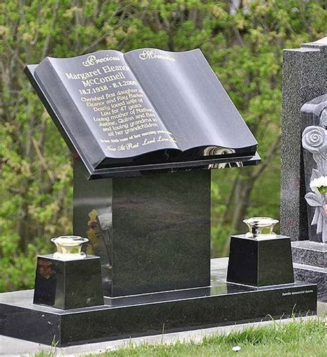 cemetery headstone/tombstone that resembles an open book on a pedestal ...