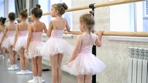 Group Of Young Dancers Using Ballet Barre Stock Footage SBV-324309638 - Storyblocks