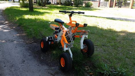 Tilting electric quad gets menacing off-road big brother