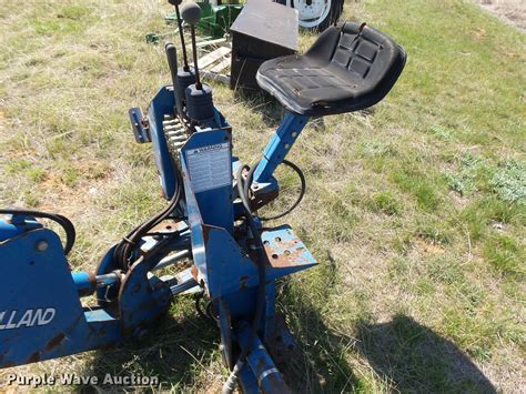 New Holland backhoe attachment in Granbury, TX | Item DE9544 sold | Purple Wave