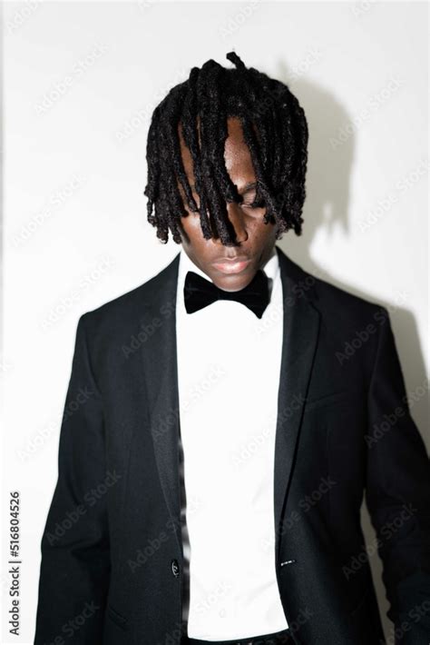 Portrait of the black man with dreadlocks wearing a suit Stock Photo ...