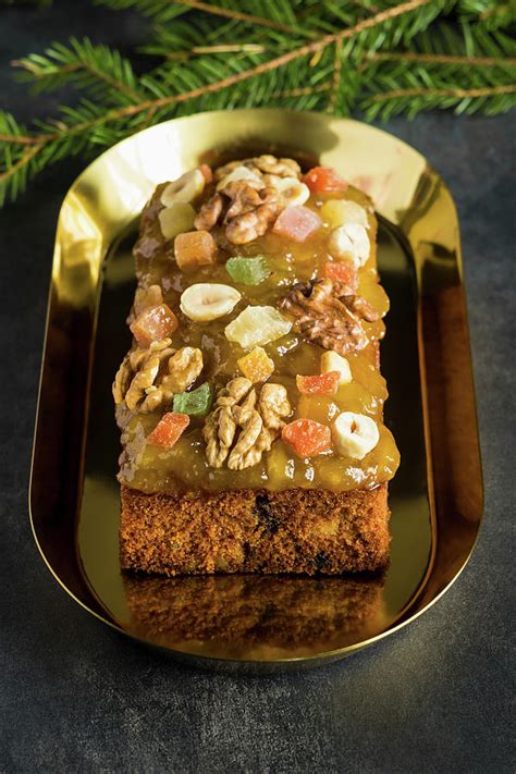 Christmas Fruit Cake With Nuts, Spices And Sweet Fruits Photograph by ...