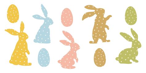 A set of Easter bunnies made of polka dot fabric sewn. Modern egg ...
