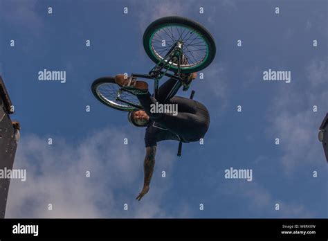 BMX tricks on a half pipe Stock Photo - Alamy