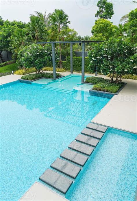 Beautiful luxury swimming pool with palm tree 3041080 Stock Photo at ...