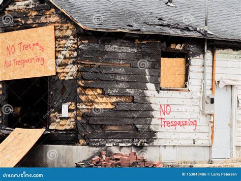 Aftermath of a house fire stock photo. Image of shingles - 153843486