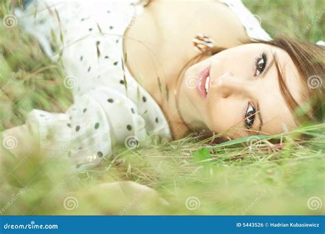 Beautiful Girl Lying Down Of Grass Royalty Free Stock Image - Image: 5443526