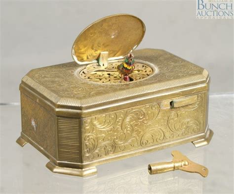 Engraved brass singing bird music box | Music box, Singing bird, Singing