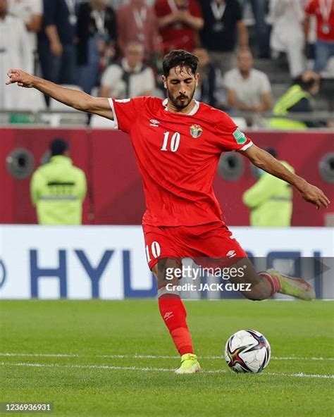 Jordan's forward Yazan al-Naimat attempts a shot during the FIFA Arab ...