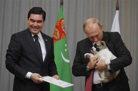 Dog lover Putin gets top breed pup as birthday gift from Turkmen leader ...