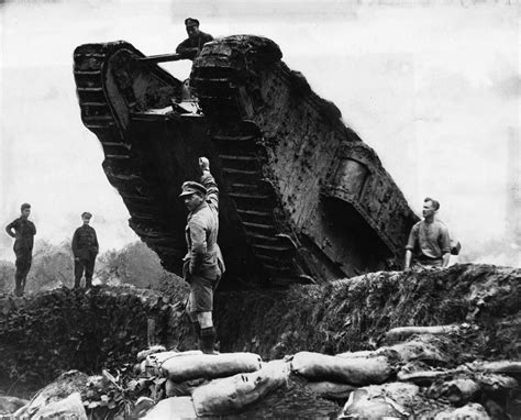 British tanks maneuvering trenches during the Battle of Cambrai, the ...