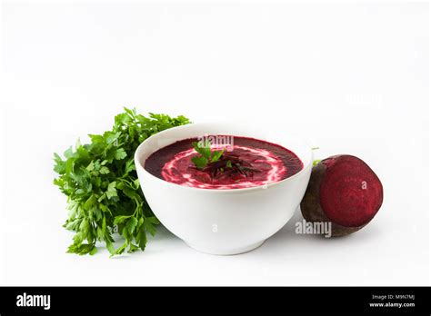 Beet soup in white bowl isolated on white background Stock Photo - Alamy