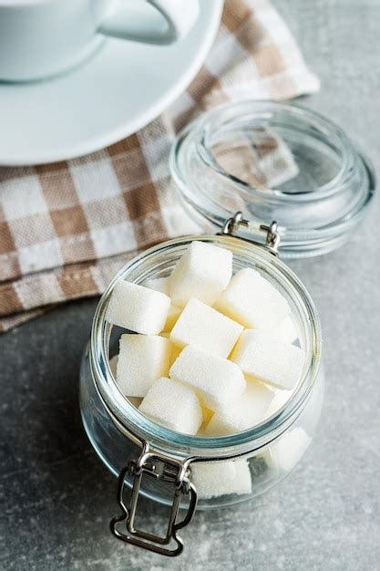 Premium Photo | Sweet white sugar cubes