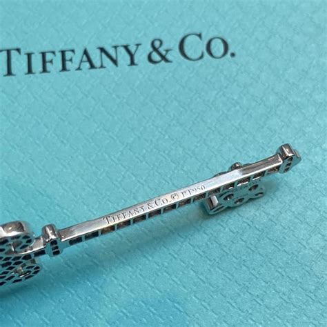 Tiffany dragonfly key PT950 with rubies and diamonds... - Depop