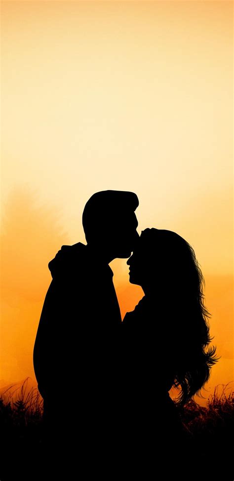 A Beautiful Couple Enjoys a Lovely Sunset Wallpaper Download | MobCup
