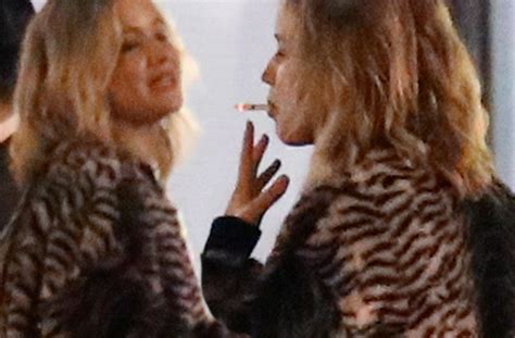 Jennifer Lawrence Seen Smoking Pals London