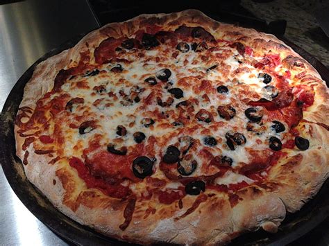 Perfect Pepperoni Pizza with Black Olives – A Food Lover’s Delight