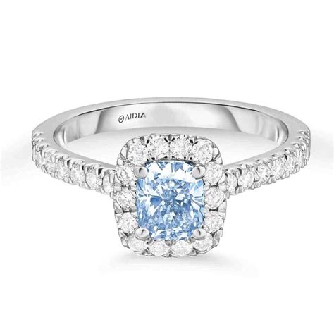 light blue diamond wedding rings | Blue engagement ring, Blue diamond wedding ring, Blue diamond ...