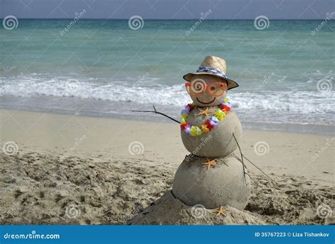 Snowman On Beach Stock Photos - Image: 35767223