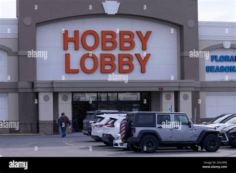 A shopper leaves the Hobby Lobby store, Monday, Feb. 6, 2023, in Manchester, N.H. (AP Photo ...