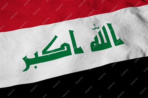 Premium Photo | Full frame closeup on a waving iraqian flag in 3d rendering