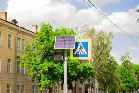 A Close-up of a Pedestrian Crossing Sign with a Solar Panel Outside. Stock Image - Image of road ...