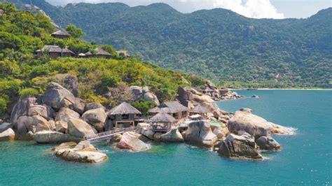 Six Senses Ninh Van Bay resort in Vietnam is surrounded by stunning rock formations, white-sand ...