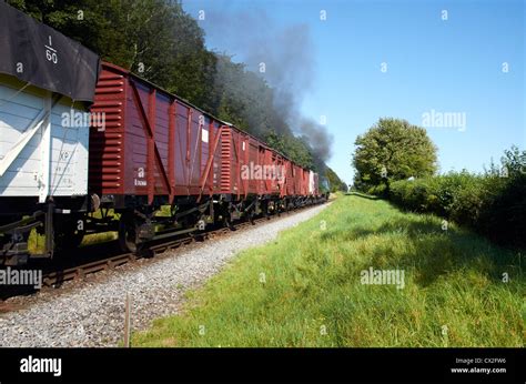 Old fashioned goods (freight) train common UK until the early 1960's Stock Photo - Alamy