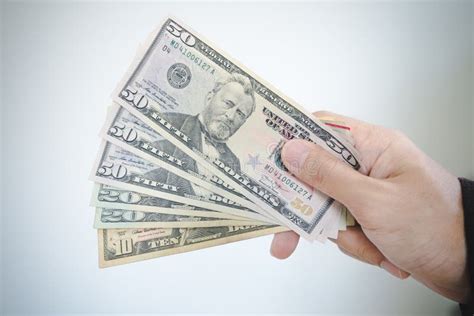 Hand holding cash stock photo. Image of concept, concepts - 65945386