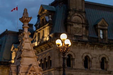 Cityscape of Downtown Ottawa, Canada at Night with Street Lights and Historic Government ...