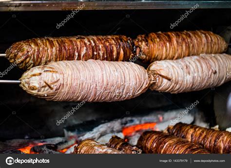 Turkish Street Food Kokorec made with sheep bowel cooked in wood fired ...