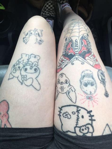 Hello Kitty Tattoo | Hello kitty tattoos, Grunge tattoo, Emo tattoos