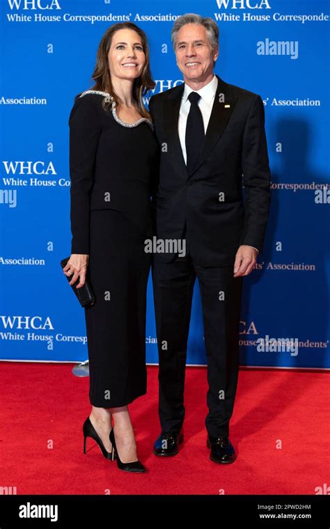 Secretary of State Antony Blinken and his wife Evan Ryan pose for ...