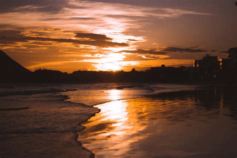 Silhouette photo of Beach during Sunset · Free Stock Photo