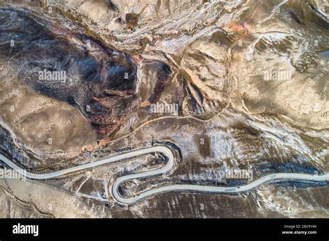 aerial view of the curved Qilian mountain road Stock Photo - Alamy