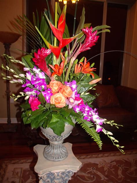 Tropical Floral arrangement by Bella by Sara | Fresh flowers arrangements, Tropical flower ...