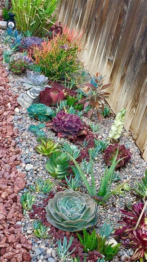 23 Beautiful Raised Flower Bed Stone Border in Front of House #raisedflowerbeds #flowerbeds ...