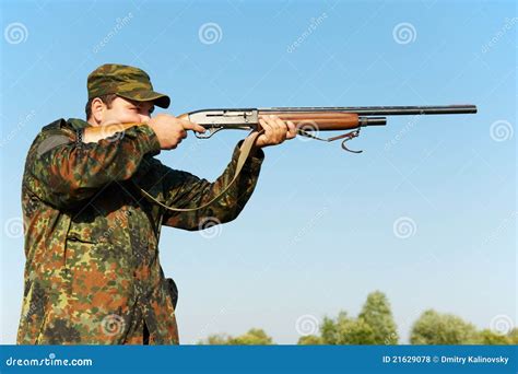 Hunter with rifle gun stock photo. Image of season, hobby - 21629078