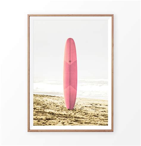 Pink Surfboard Standing on Golden Sand Print – Seven Paper Prints