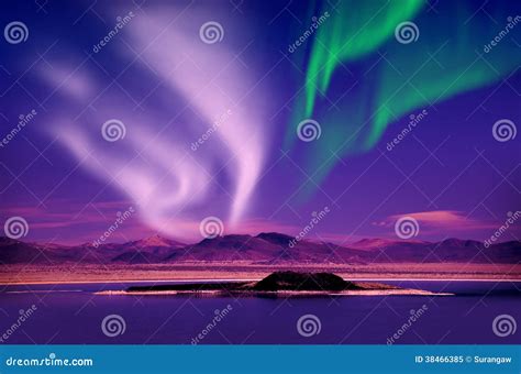 Northern Lights Aurora Borealis in the Night Sky Over Beautiful Lake Landscape Stock Image ...