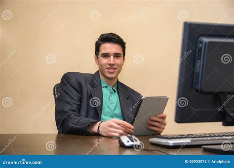 Young Man Wearing Business Suit in Office with Stock Photo - Image of computer, businessman ...